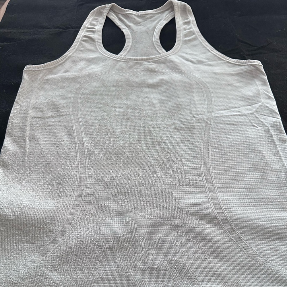 Lululemon Racerback. Size 8. Ivory color with slight pattern.